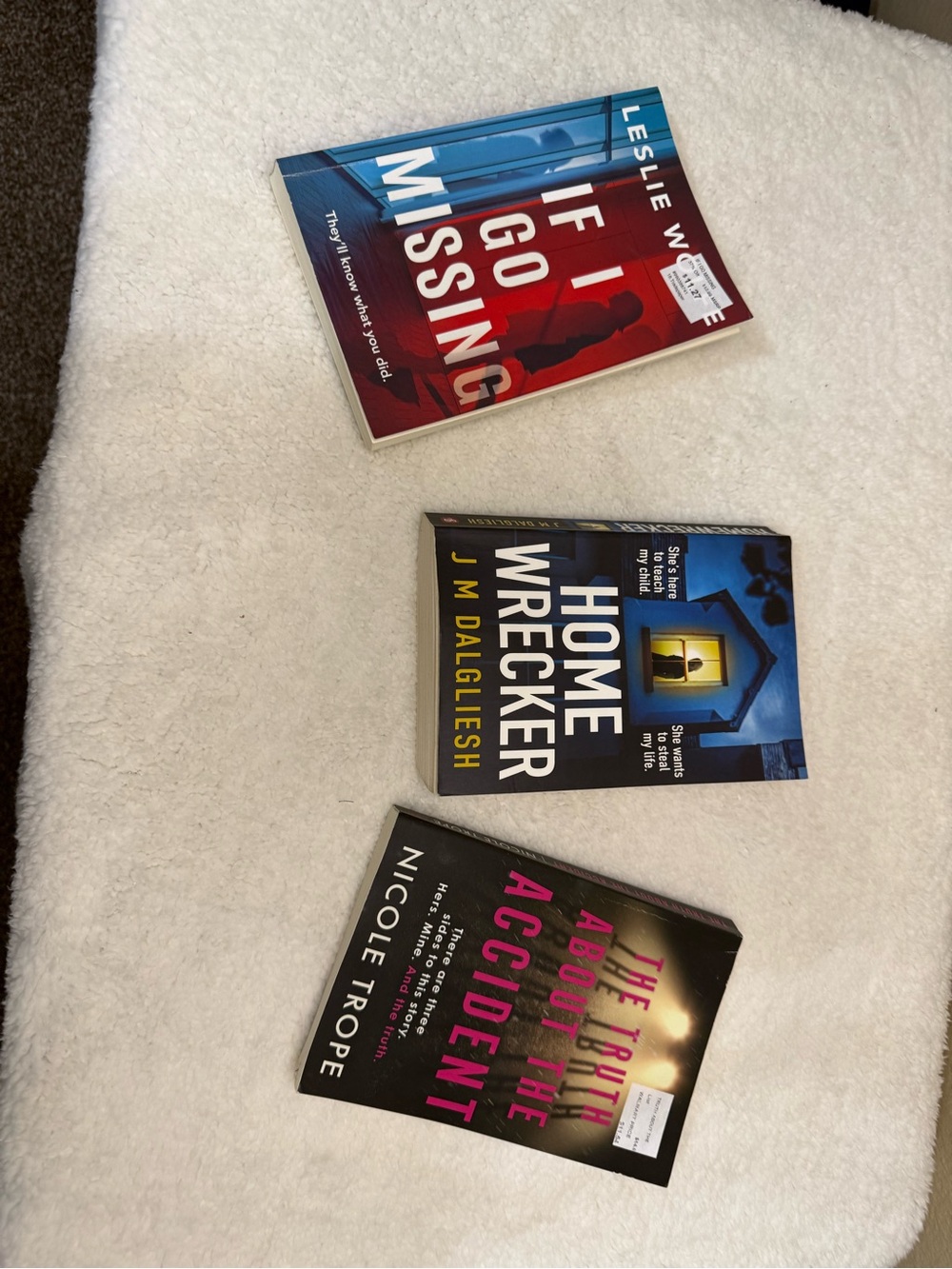 Assorted Paperback Mystery Books - Red, Blue, Black Covers